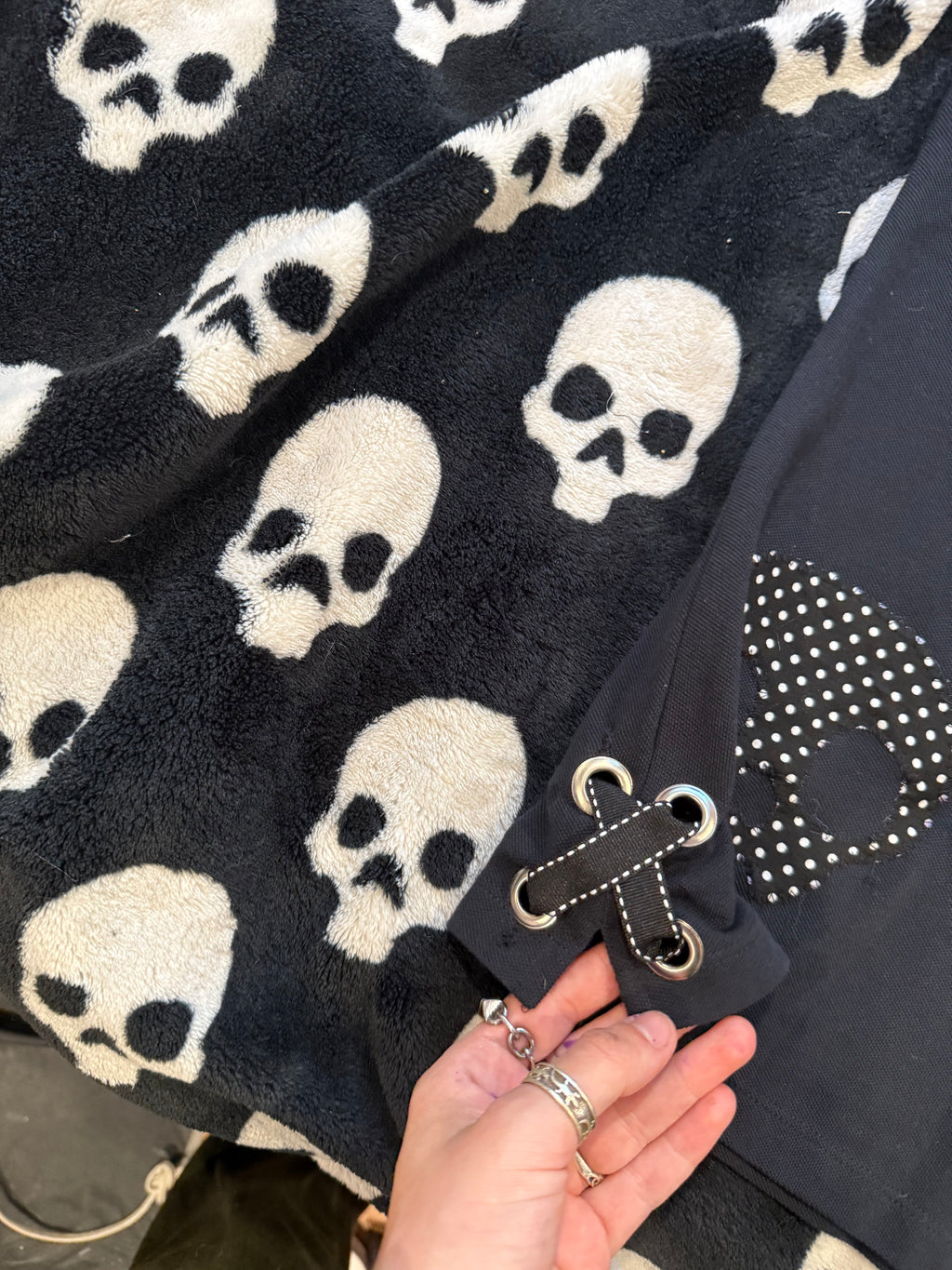 black polka dot skull polo size m