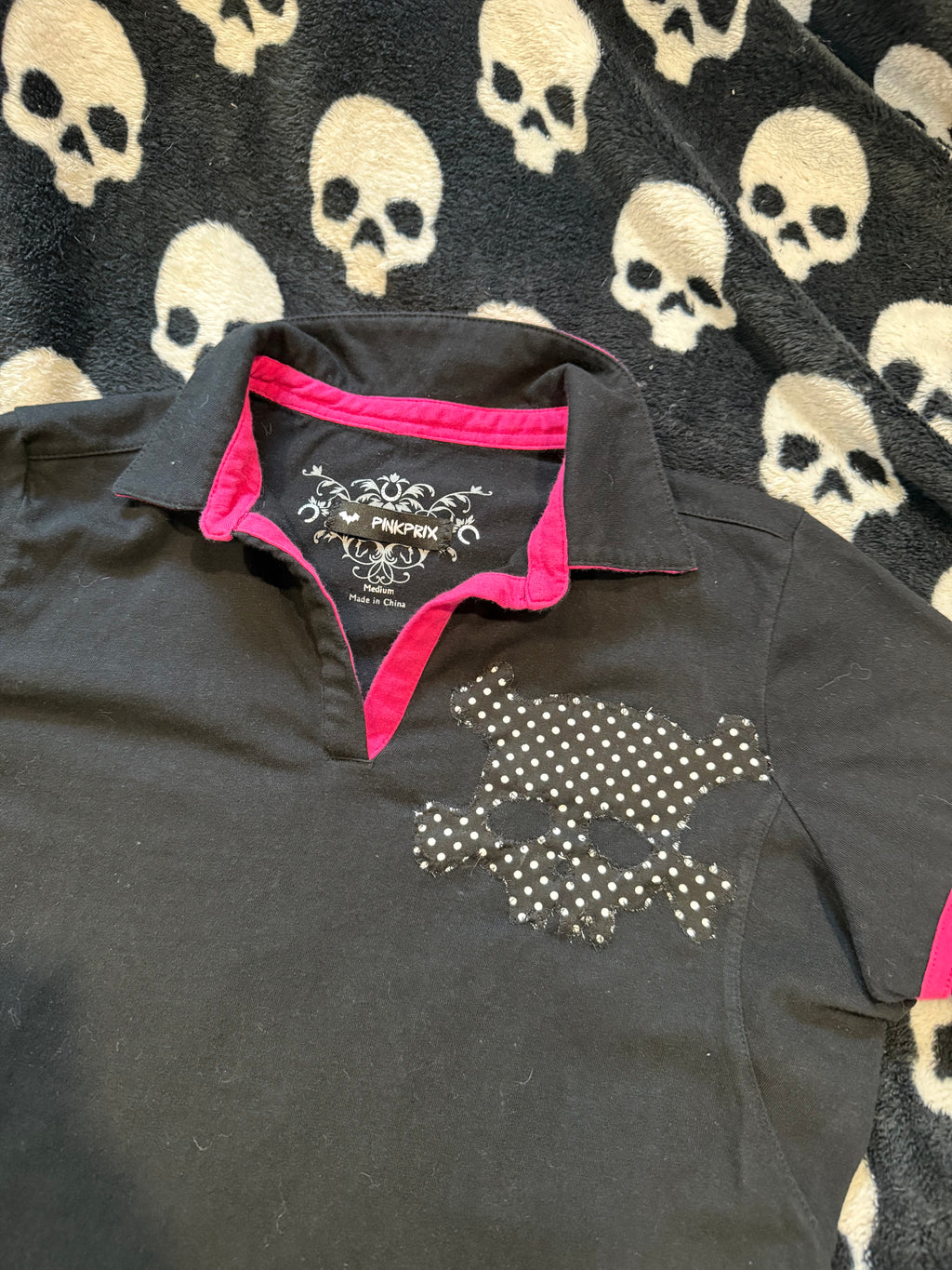 pink & black polka dot skull lace up polo size m