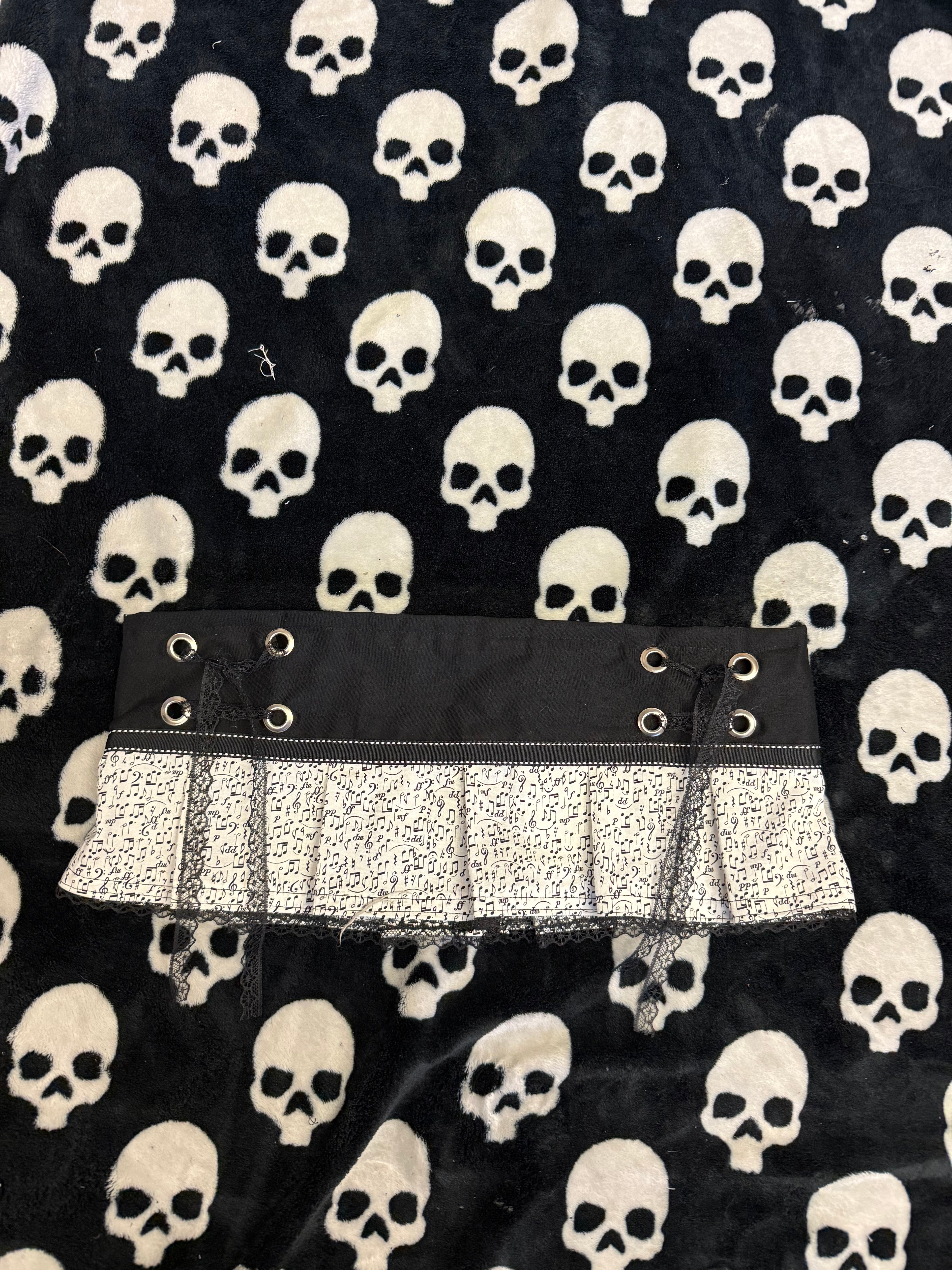 music note lace up mini skirt size m