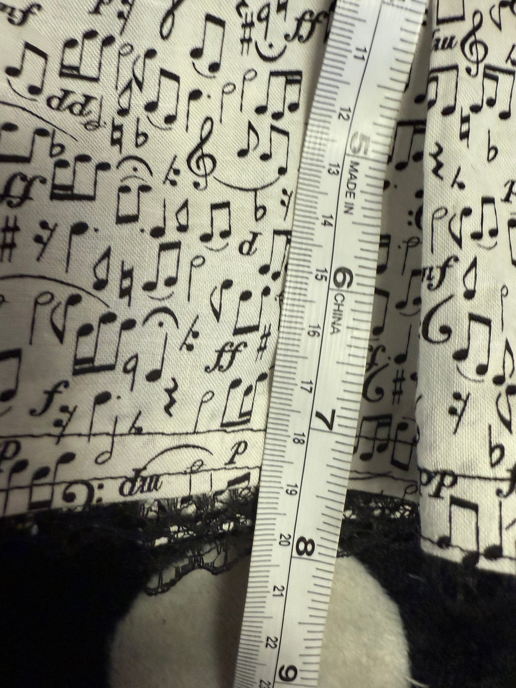 music note lace up mini skirt size m