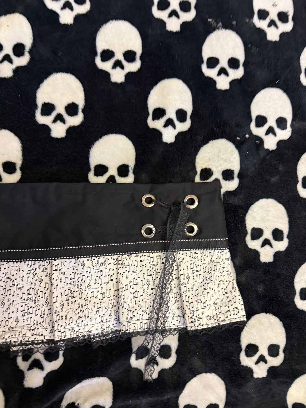 music note lace up mini skirt size m